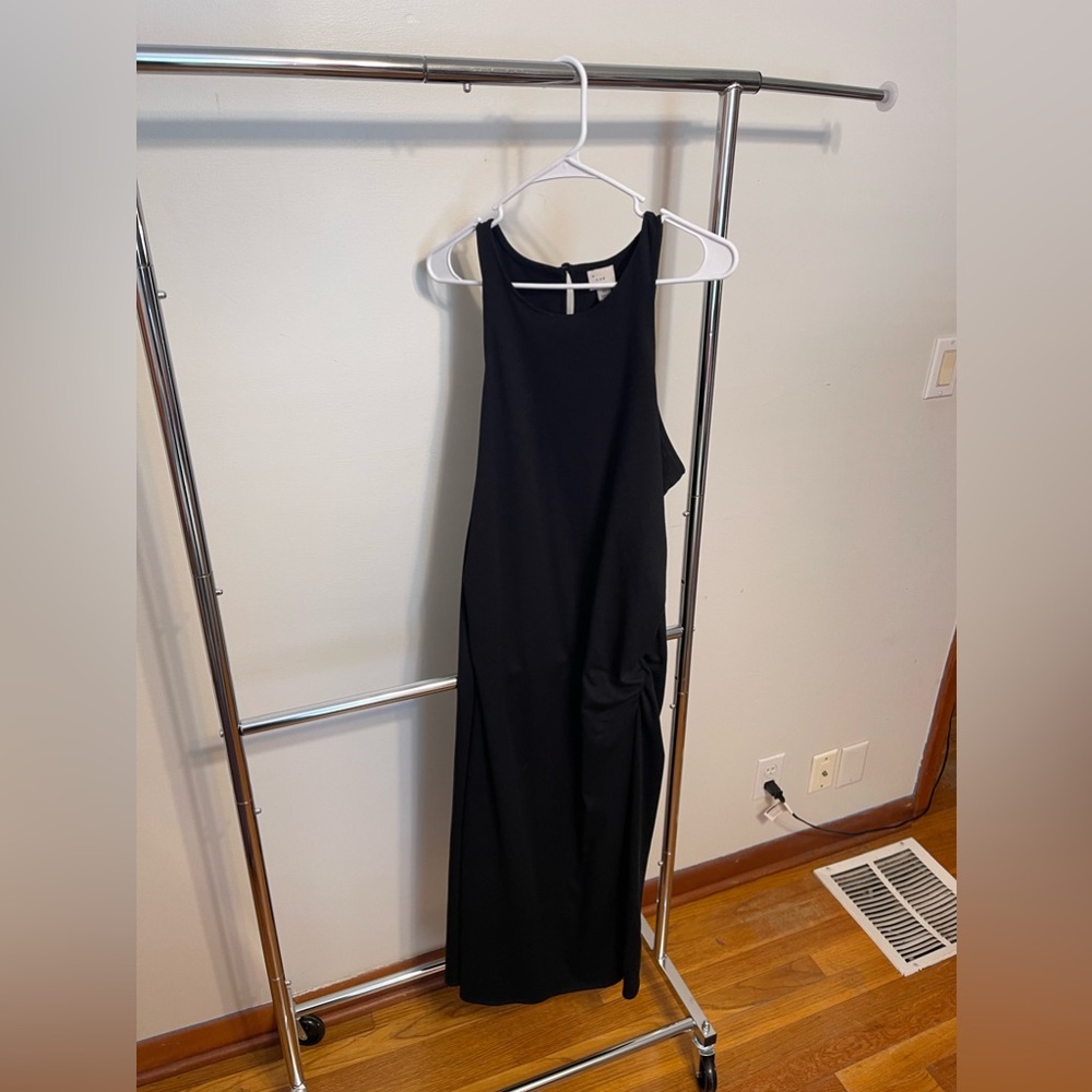 A new day dress, color black dress, size xl, only worn once, great condition